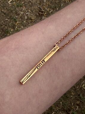 Rose gold “resist” necklace